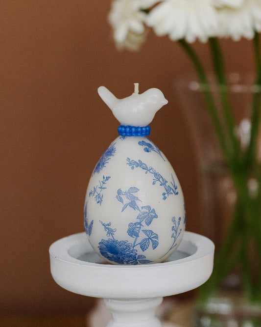 Close-up of blue floral chinoiserie pattern on Easter egg candle