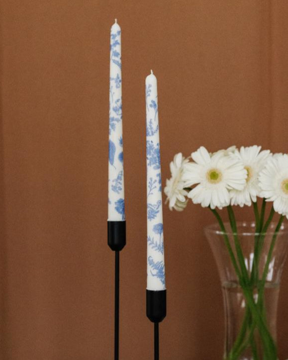 Set of 2 chinoiserie-style tall taper candles with intricate floral and crane motifs