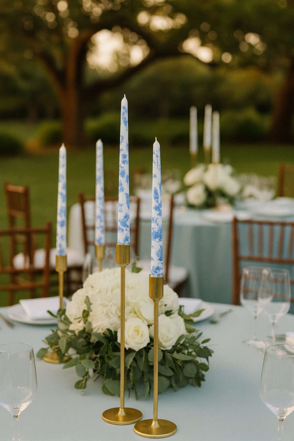 Elegant taper candle set with East Asian-inspired art for dinner table décor